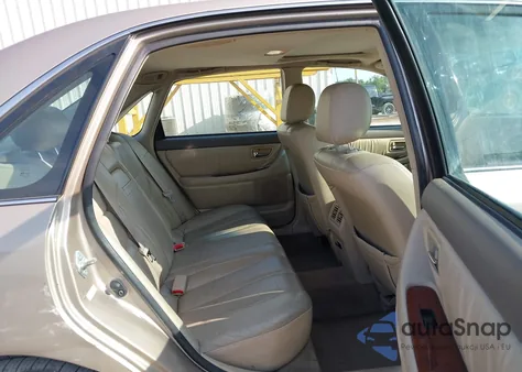 2001 Toyota Avalon Xls z USA, uszkodzony, nr VIN 4T1BF28B61U182009